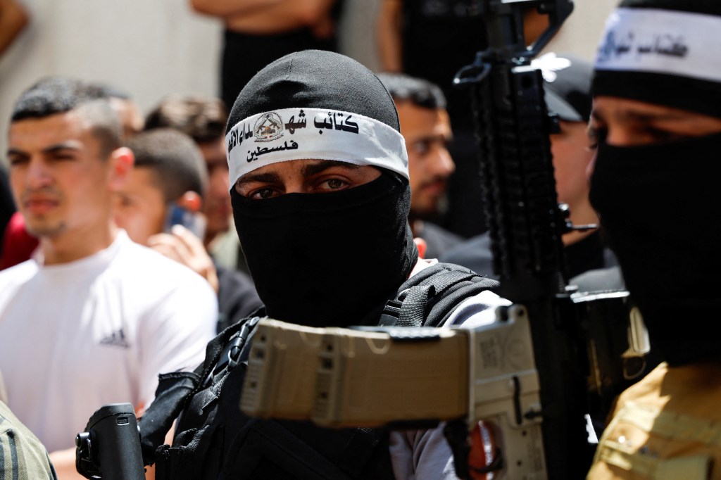 The Latest | Israeli troops withdraw from Khan Younis ahead of expected ...